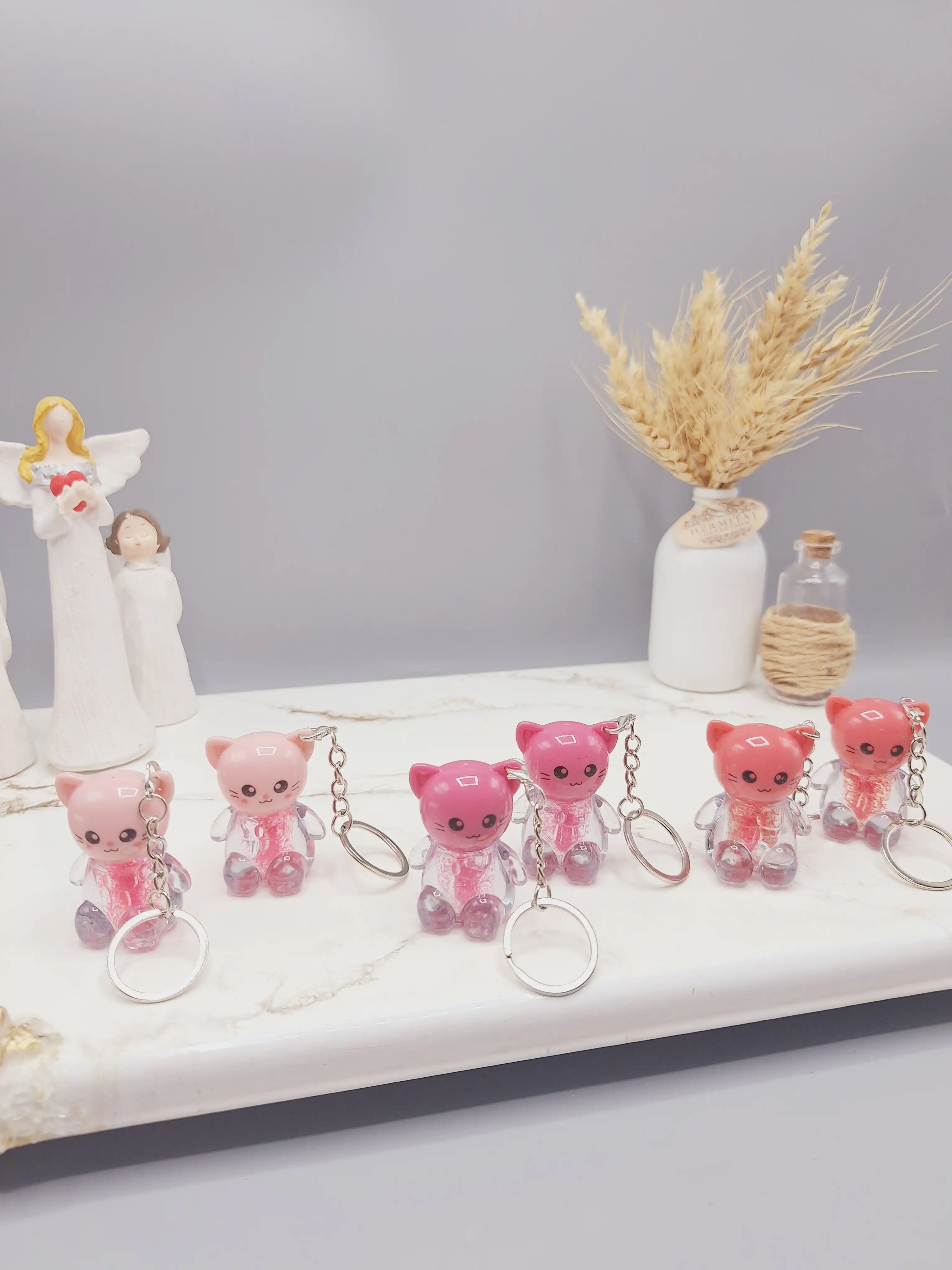 برق لب شاین دار طرح گربه آویز دار کیوت برند IMAN OF NOBLE کد 7149