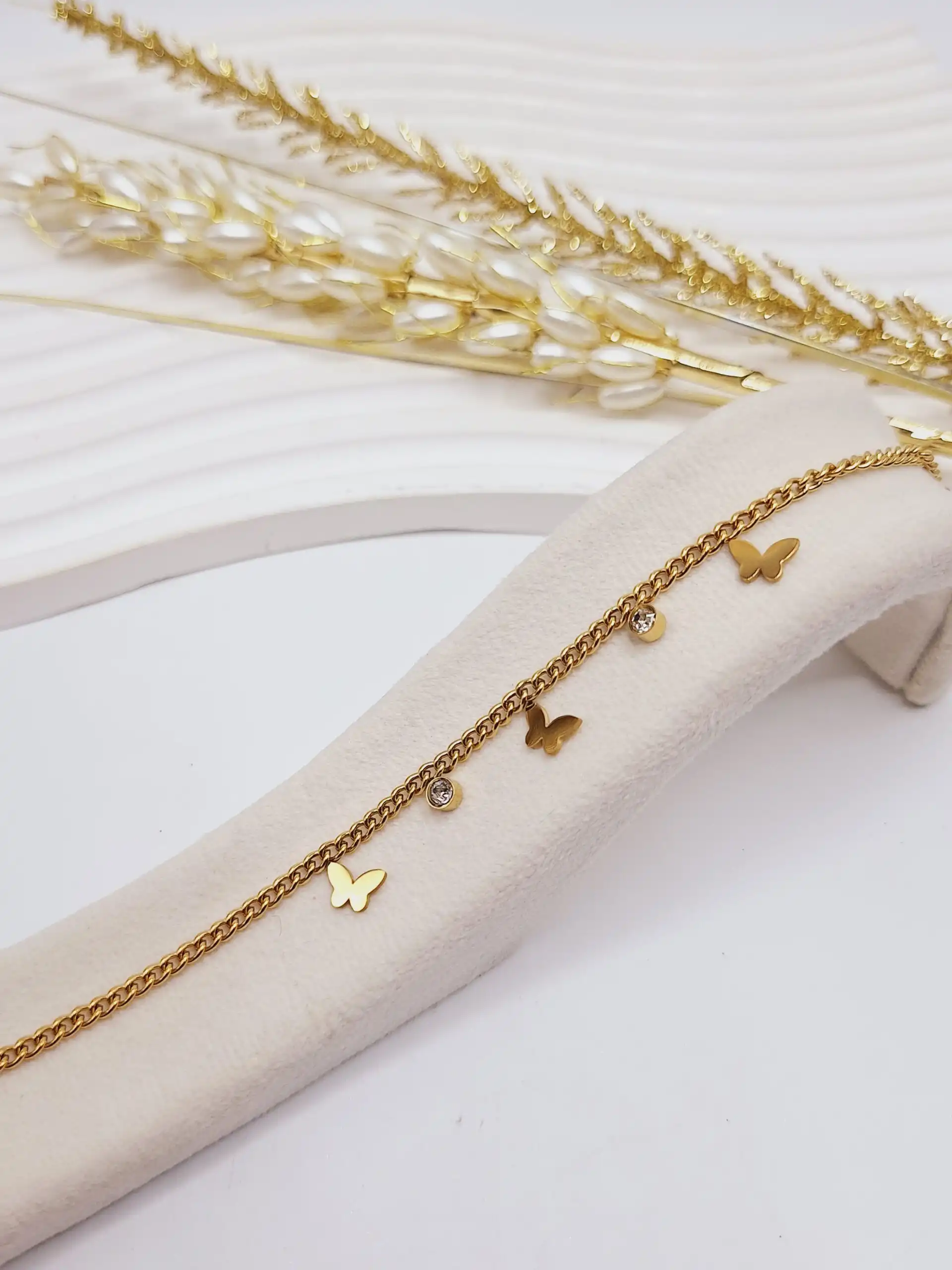پابند زنجیری طرح پروانه و نگین طلایی